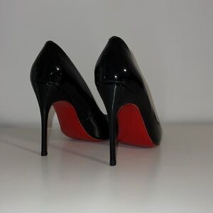 Black stiletto patent leather heel